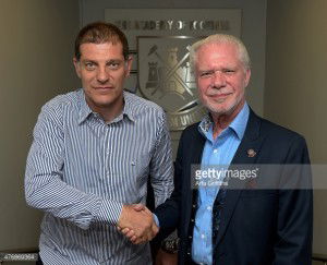 The manager and co- chairman in much happier times.