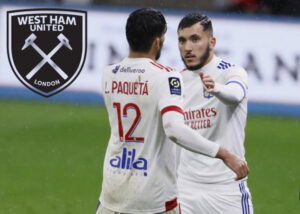 Cherki shakes hands with Lucas Paqueta