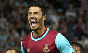 James Tomkins of West Ham United celebrates scoring the winning goal