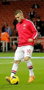 Jack_Wilshere_warm_up_-_12_Feb_2014_(cropped)