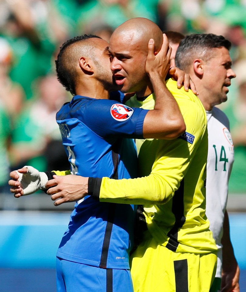 Darren Randolph and France's Dimitri Payet hug after the game REUTERS/Jason Cairnduff Livepic