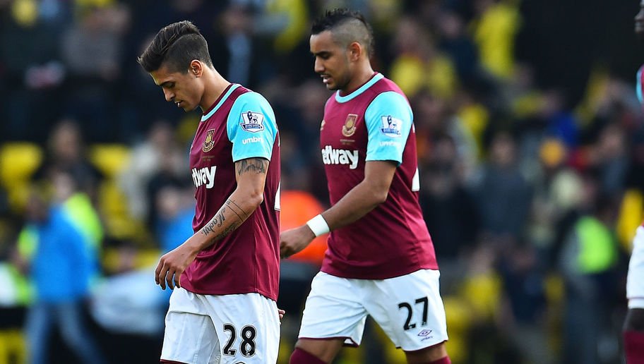WATFORD, ENGLAND - OCTOBER 31:  Manuel Lanzini, Dimitri Payet, Cheikhou Kouyate and Aaron Cresswell of West Ham United look dejected after conceding during the Barclays Premier League match between Watford and West Ham United at Vicarage Road on October 31, 2015 in Watford, England.  (Photo by Justin Setterfield/Getty Images)