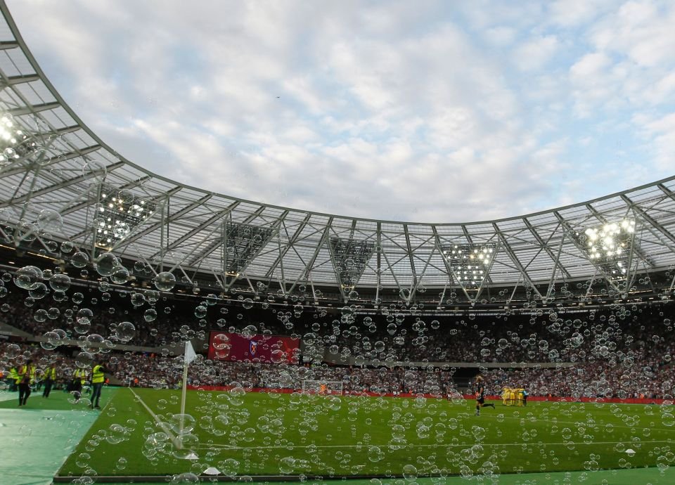 Bubbles fill the air ahead of the qualifying third round second leg Europa League football match between West Ham United and NK Domzale at the London Stadium in east London on August 4, 2016. West Ham are playing their first competitive match at their new home, the London 2012 Olympic Stadium, against Slovenia's NK Domzale in the third qualifying round of the Europa League. / AFP PHOTO / Ian KINGTONIAN KINGTON/AFP/Getty Images