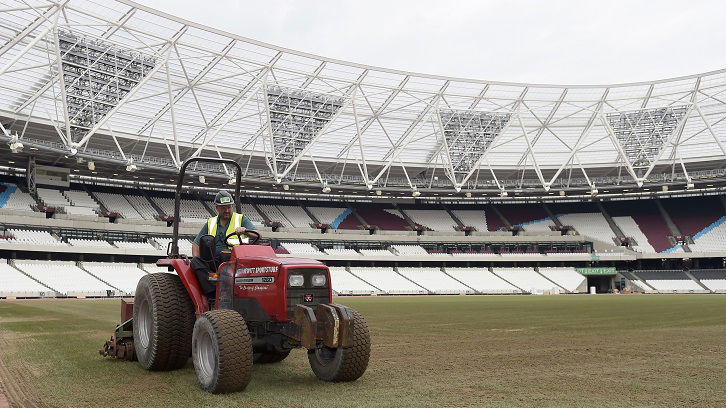 Pic by Arfa /  Griffiths Photographers Greg Bolton Head Groundsman at the QEOP supervises seeding the pitch 08-06-2016  NO FREE USE